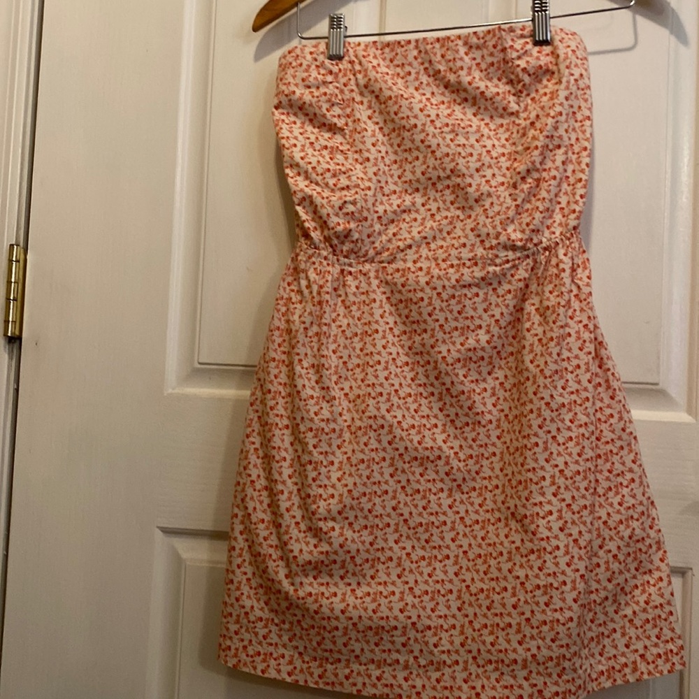 Brand: (Mudd) strapless summer dress. Color: flowery white and orange. Size: S